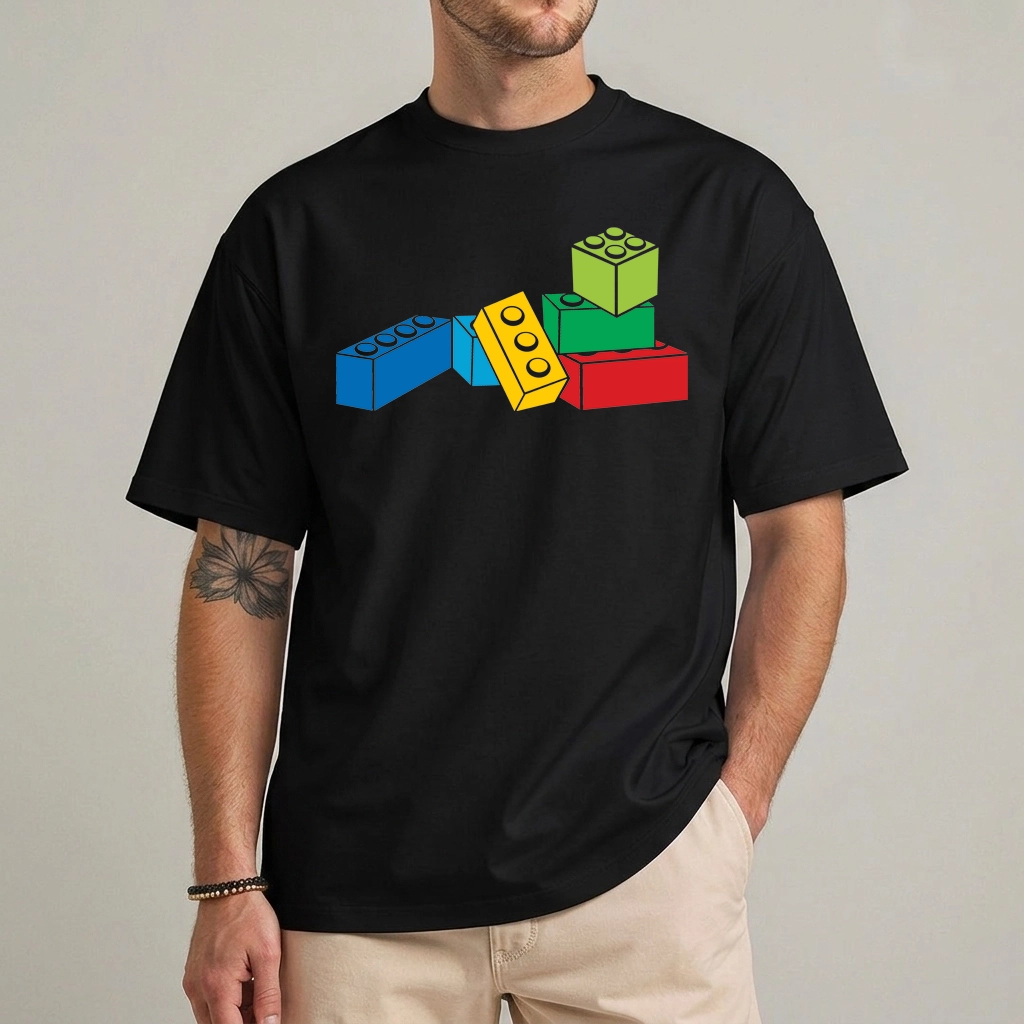 Building Bricks Shirt — Master Builder Birthday Tee 1 Building bricks shirt with colorful toy brick graphic, front view