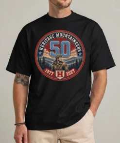 Heritage Mountaineers Shirt in black with a 50th anniversary varsity crest dated 1977 to 2027