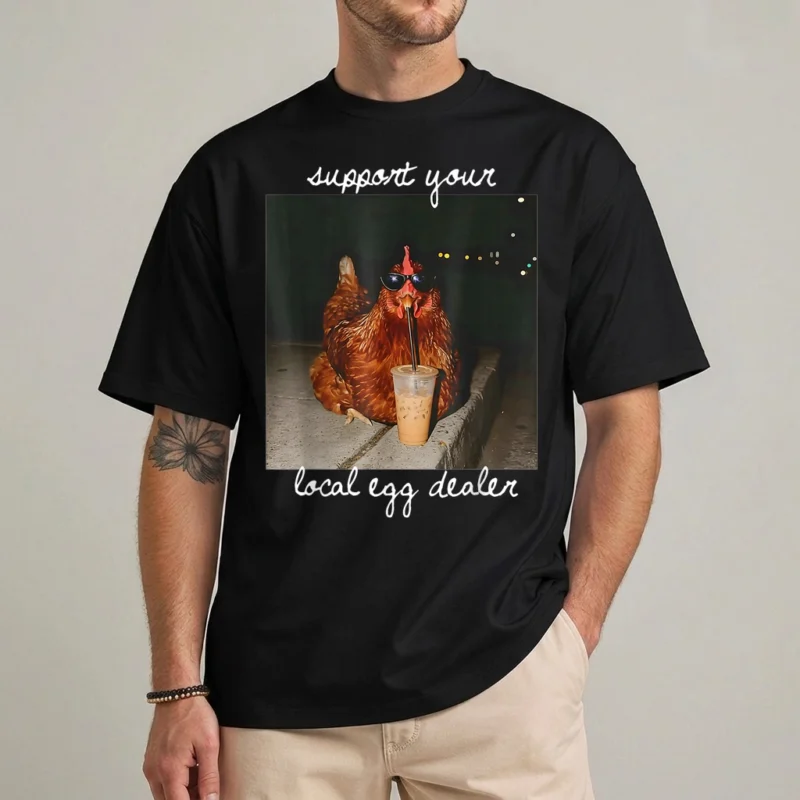 Support Your Local Egg Dealer Shirt – Funny Tee 2 Support Your Local Egg Dealer shirt with sunglasses-wearing hen drinking iced coffee