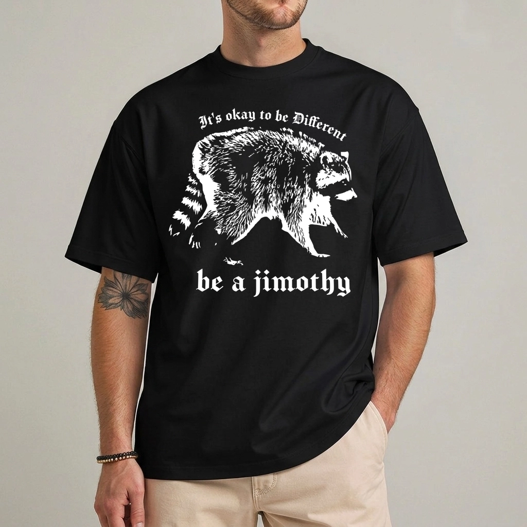 Jimothy Raccoon Shirt | It's Okay To Be Different Tee 1 Jimothy Raccoon Shirt in black with a line-art raccoon and the words be a jimothy in blackletter