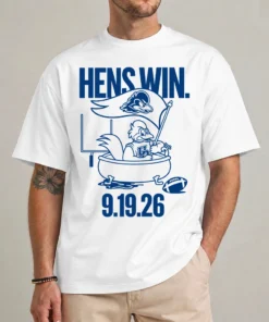 Model wearing a white Delaware Hens Win shirt with a blue mascot-style bathtub illustration and 9.19.26 date