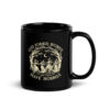 God Forbid Women Have Hobbies mug, black glossy mug with four witches dancing in a ring under a crescent moon in cream ink