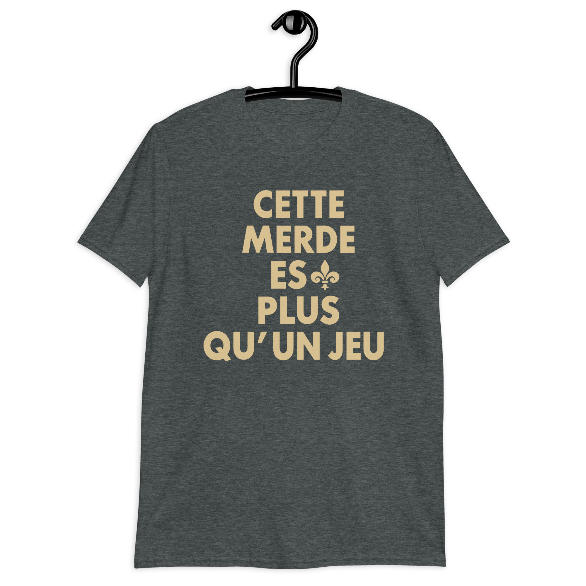 Cette Merde Est Plus Qu’un Jeu Saints Shirt 3 Dark heather shirt with stacked gold French slogan lettering and a fleur-de-lis beside ES, front view