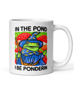 Wizard frog mug with a blue star robe, wooden staff and red mushrooms, text In The Pond I Be Ponderin